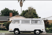 old white van parked outside house